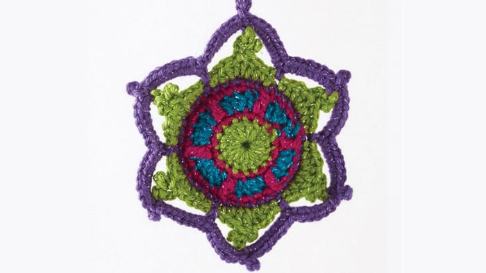 Jewelled Snowflake featuring Caron Simply Soft Party Yarn